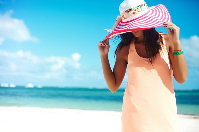 How to dress to protect against sun damage - Beachy Cover Ups