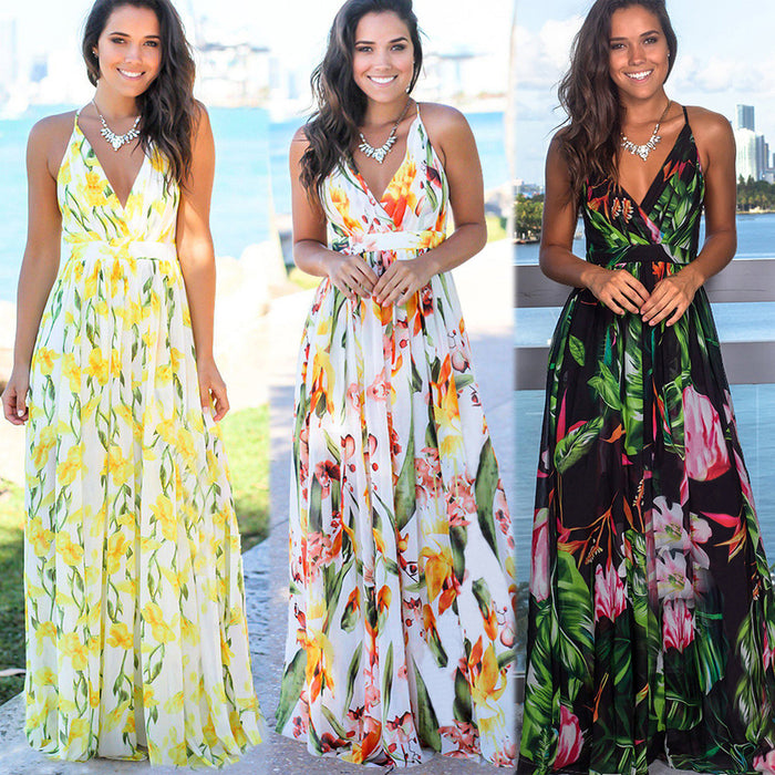 A woman in a Beachy Cover Ups' Long Floral Resort Beach Dress is posing for a photo.