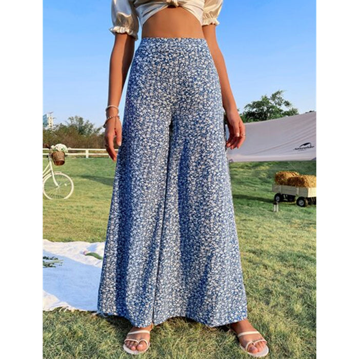 A woman is standing in a field wearing Beachy Cover Ups' Stretchy High Waist Wide Leg Beach Pants.