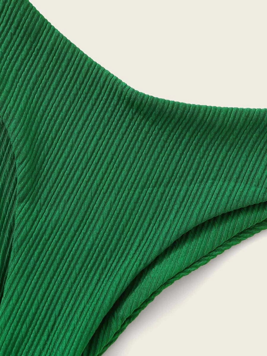 A close up of a Beachy Cover Ups Beachy Bandeau Bikini Solid Striped Texture bikini bottom.